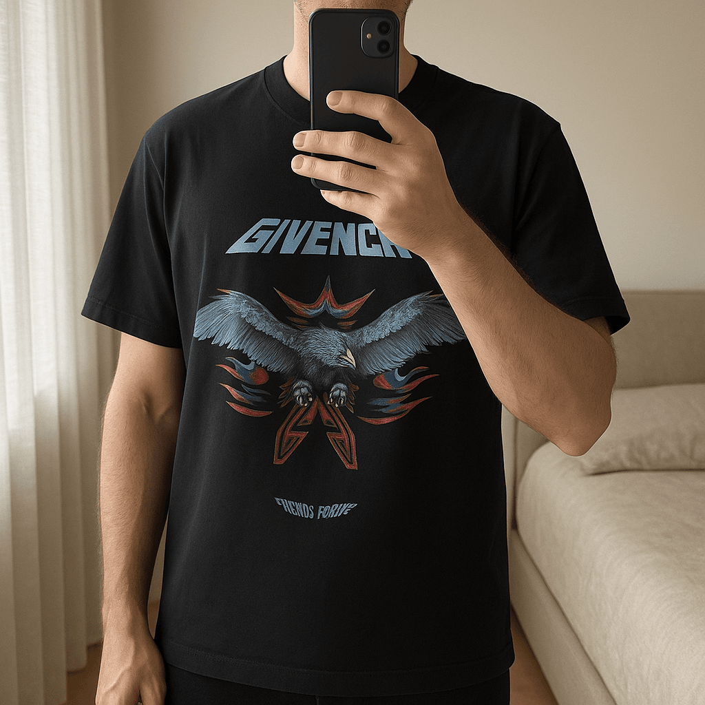 Givenchy Small Men’s t-shirt standing straight facing the camera, in a softly lit bedroom setting, with gentle natural light filtering through a window.